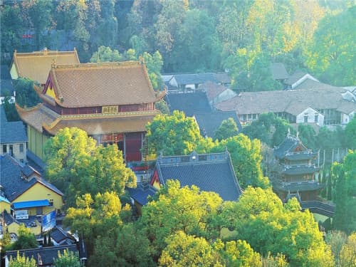Lingyin Temple buildings surrounded by green hills in Hangzhou