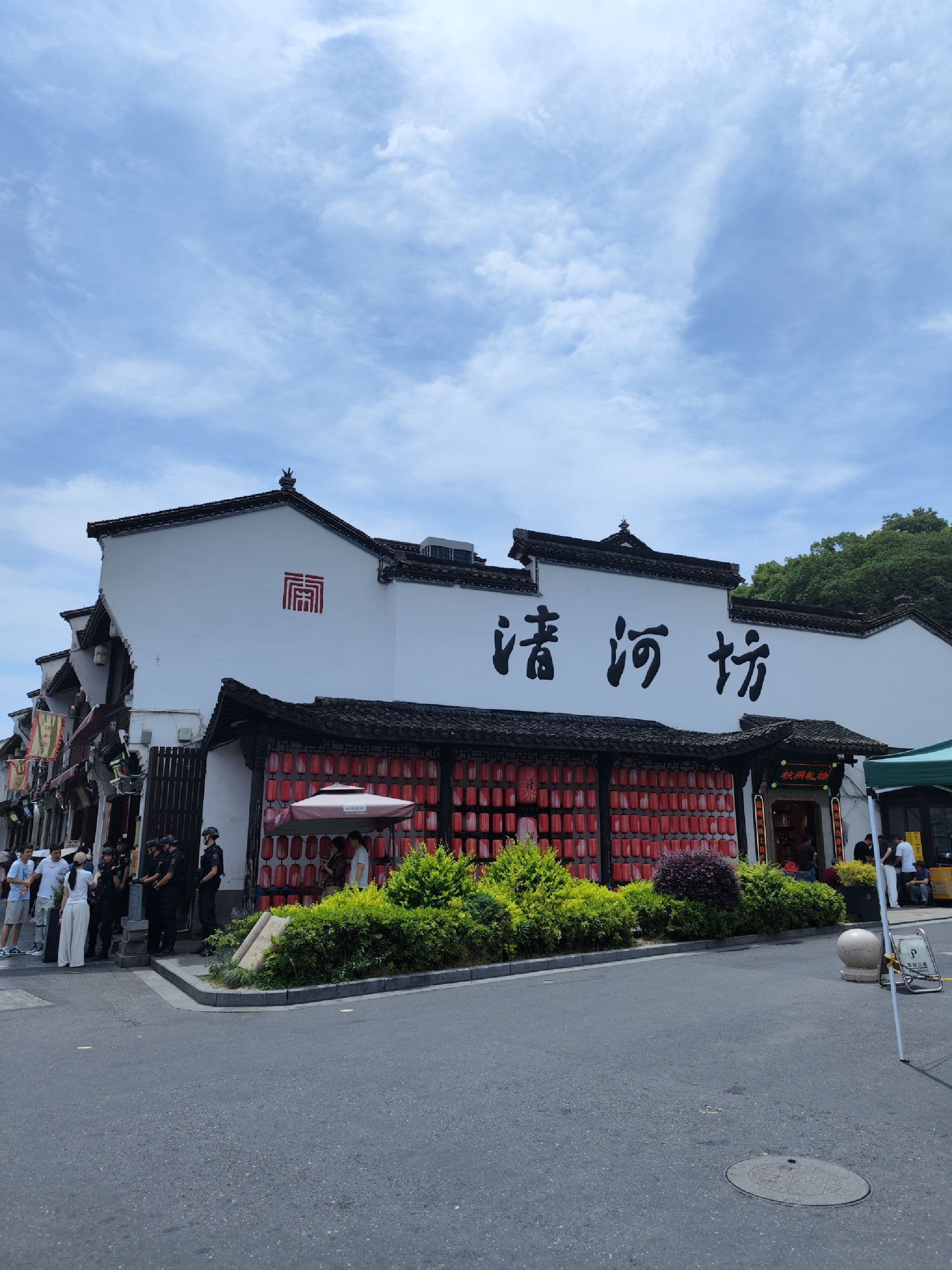 Traditional white-walled entrance on Hefang Street in Hangzhou
